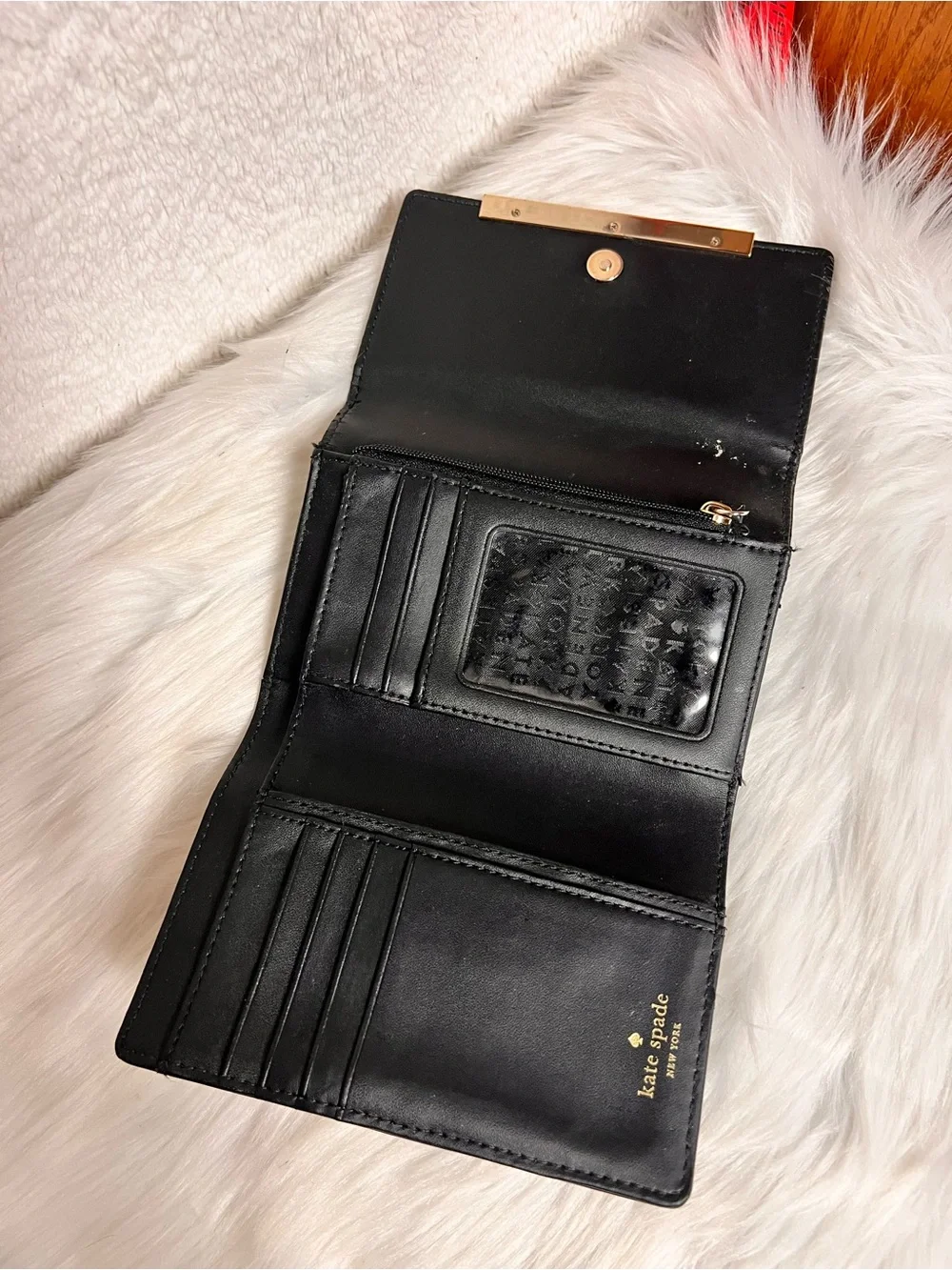 kate spade Black Leather Wallet with Gold Bar Accent